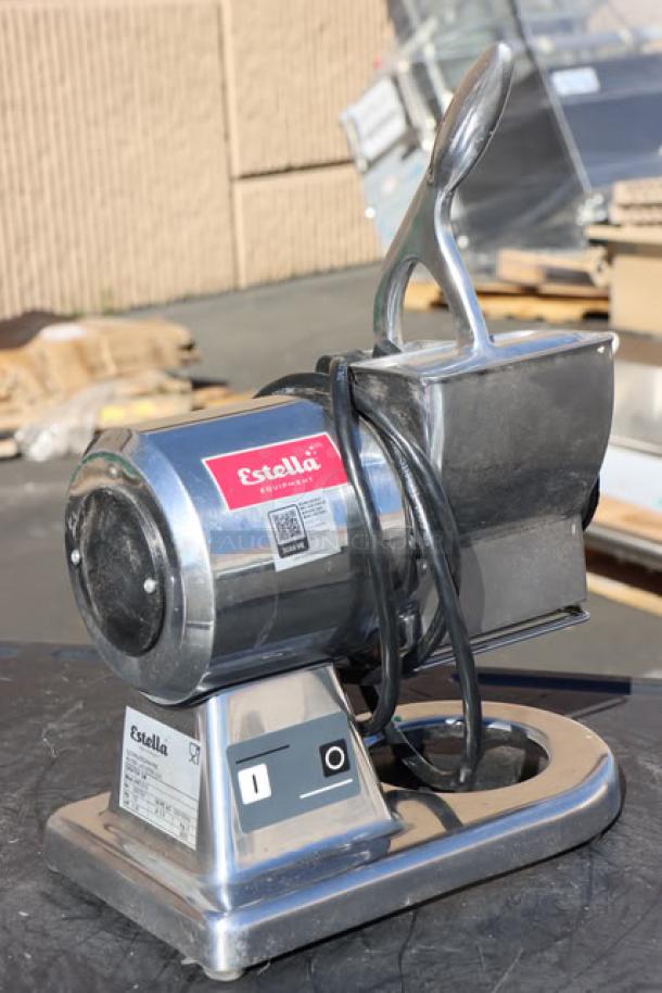 Estella CG12 electric hard cheese grater in stainless steel, 1/2 HP, 120V, new condition, with visible branding and labels.