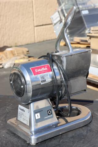 Estella CG12 electric hard cheese grater in stainless steel, 1/2 HP, 120V, new condition, with visible branding and labels.