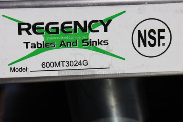 Regency Tables and Sinks model 600MT3024G label, indicating stainless steel commercial equipment compliance with NSF standards.