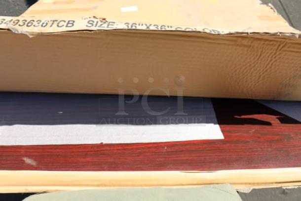 Cardboard packaging partially opened to reveal a 36" x 36" reversible cherry/black laminated square table top.