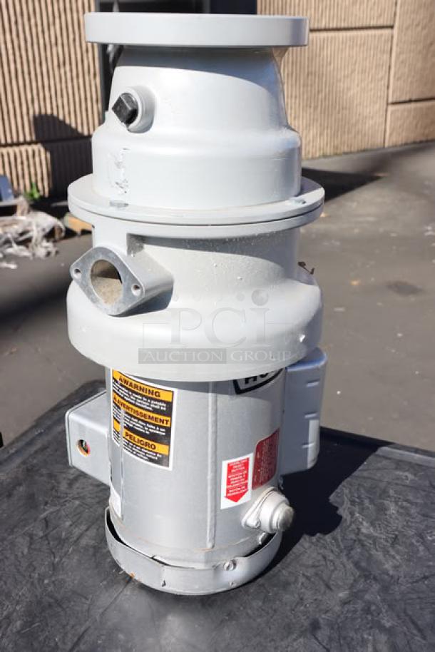 Hobart FD4/50-3 Commercial Garbage Disposer, 1/2 hp, 120/208-240V, out of packaging, visible safety labels.
