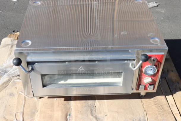 Avantco DPO-18-S Single Deck Countertop Pizza/Bakery Oven, stainless steel, controls visible, scratches on top surface.