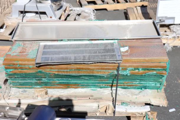 Stack of 11 wood tabletops, top piece with visible cracks, auctioned as 11x your bid.