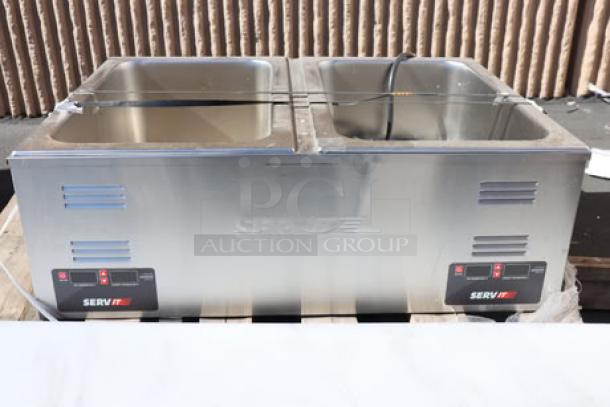 Brand new ServIt FW200D 12"x20" dual well electric food warmer, digital controls, 120V, 2000W, minor scratches/dents.