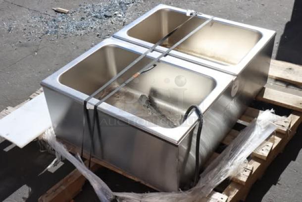 BRAND NEW ServIt FW200D dual well electric food warmer, 12"x20", 2000W. Out of packaging, minor scratches, no dents visible.