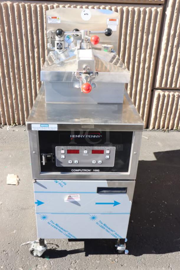 BRAND NEW Henny Penny PFE500 Electric Pressure Fryer, Computron 1000 Controls, 208V, 3 Phase, some minor scratches/dents.
