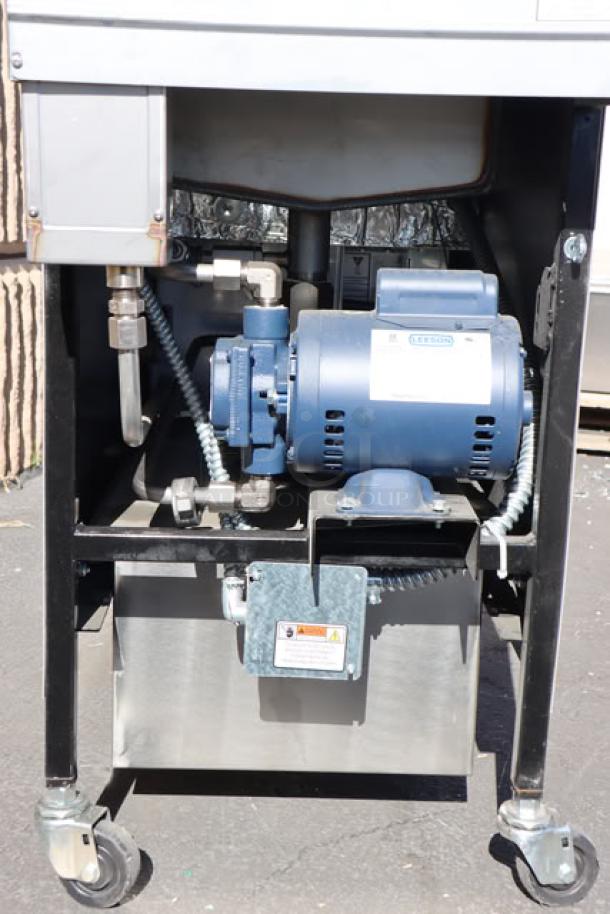 Brand new Henny Penny PFE500 electric pressure fryer, 4-head, with Computron 1000 controls, 208V, 3 Phase. Minor scratches/dents.