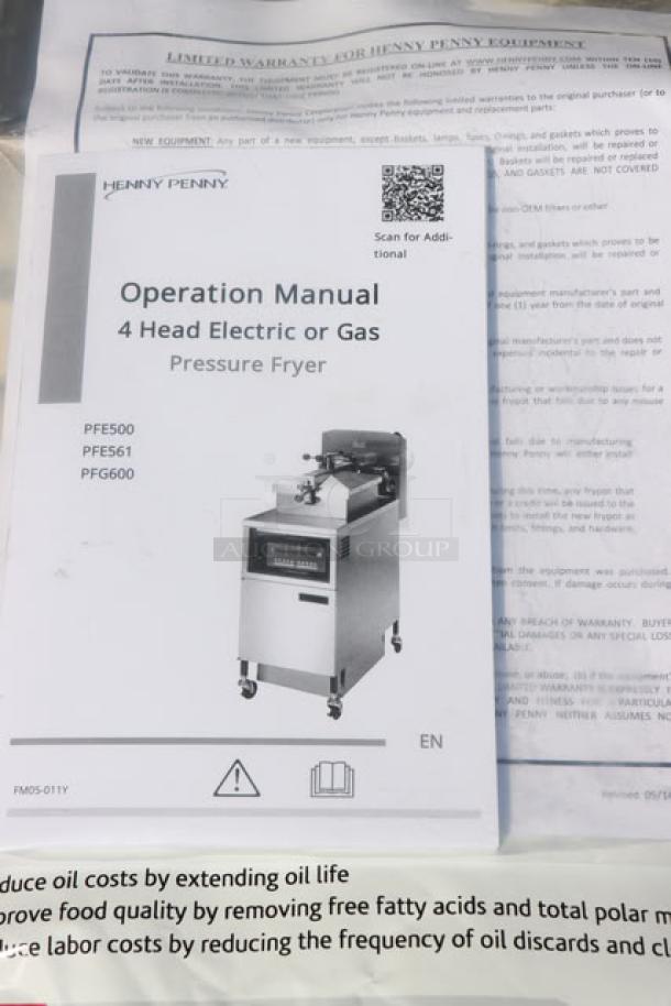 BRAND NEW Henny Penny PFE500 4-Head Electric Pressure Fryer with Computron 1000 Controls. Manual and warranty visible.