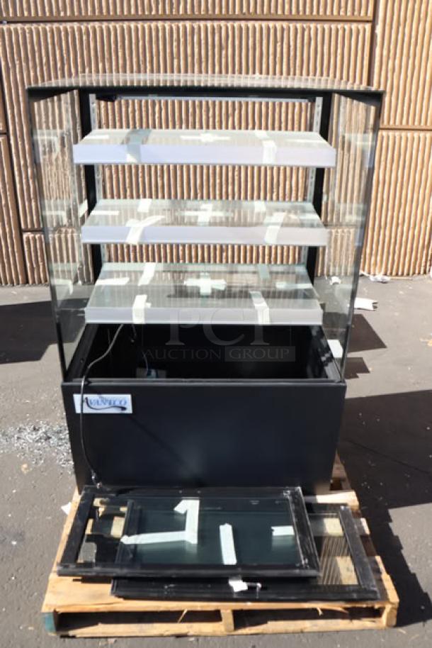 Brand new Avantco BCF-36-HC bakery display case, 35 3/8", black. One glass sliding door broken; otherwise functional.