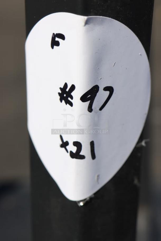 Lancaster chair tag with "F #97 +21" marking, referencing bidding information.