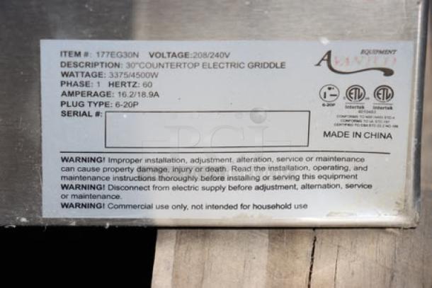 Avantco EG30N electric griddle label, 30", 208/240V, 3375W-4500W, warnings, and specifications, visible rust.