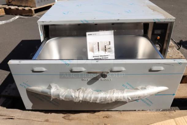 A single freestanding drawer warmer from ServIt, model WDSFS-1, with some scratches. Packaging is missing or damaged.