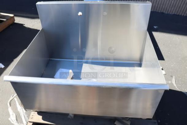 Stainless steel utility sink, 36"x24"x14", includes pre-drilled holes for faucet, new condition, ideal for commercial use.