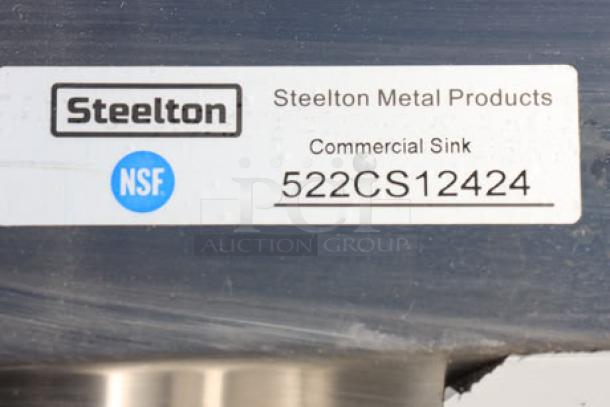 Label displaying "Steelton Metal Products Commercial Sink 522CS12424" with NSF certification mark.