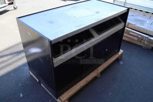 All State Manufacturing OCS490 coffee stand, 49"x23.25"x34", with two condiment trays. Top panel dented and scratched.