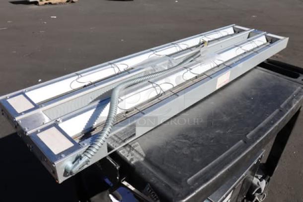 BRAND NEW SCRATCH-N-DENT ServIt ENSW60ID-1-A 60" Double Strip Warmer, dual controls, 120V, 2,200W, small dent in center.