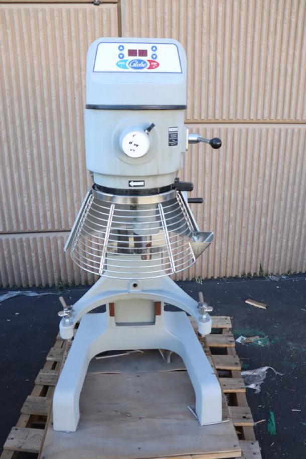 Brand new Globe SP40 40 Qt. Planetary Floor Mixer with Guard, 208V, 3 Phase, 2 hp, serial number 7452007; scratch-n-dent condition.
