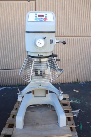 Brand new Globe SP40 40 Qt. Planetary Floor Mixer with Guard, 208V, 3 Phase, 2 hp, serial number 7452007; scratch-n-dent condition.