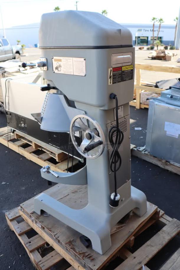 Brand new Globe SP40 40 Qt. planetary floor mixer with guard, 208V, 3 phase, 2 hp. Minor scratches, serial #7452007.