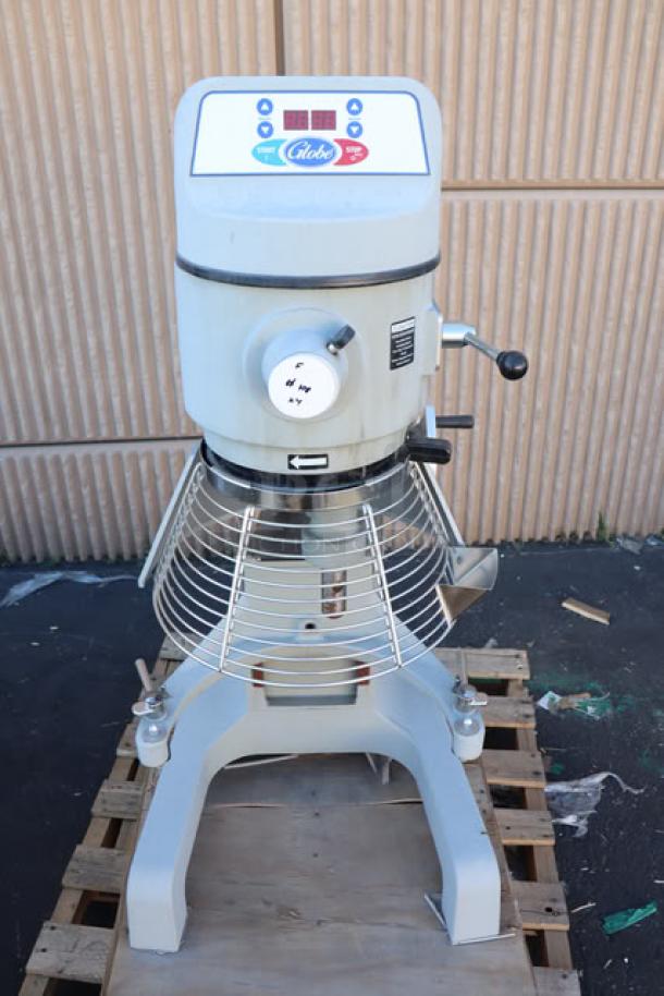 Brand new Globe SP40 40 Qt. planetary floor mixer. Features guard, 208V, 3 Phase, 2 hp, S/N: 7452007, slight surface scratches.