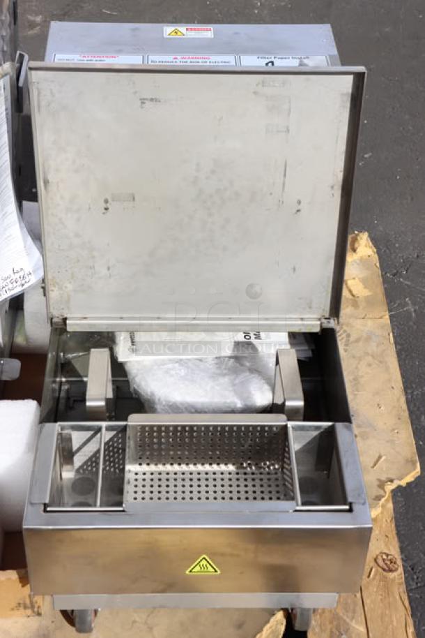 BRAND NEW Fryclone OF-55 oil filter machine, 55 lb. capacity, 2-way pump, 120V; scratch-n-dent condition, broken wheel.