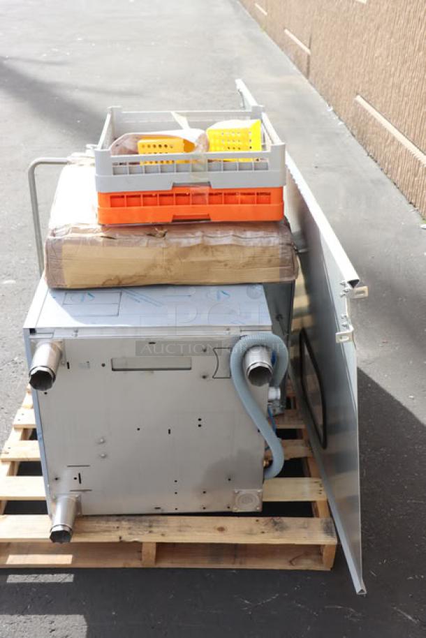 Brand new Noble Warewashing DTVL1 ventless dishwasher on pallet, missing back right leg. S/N: 8103368968.