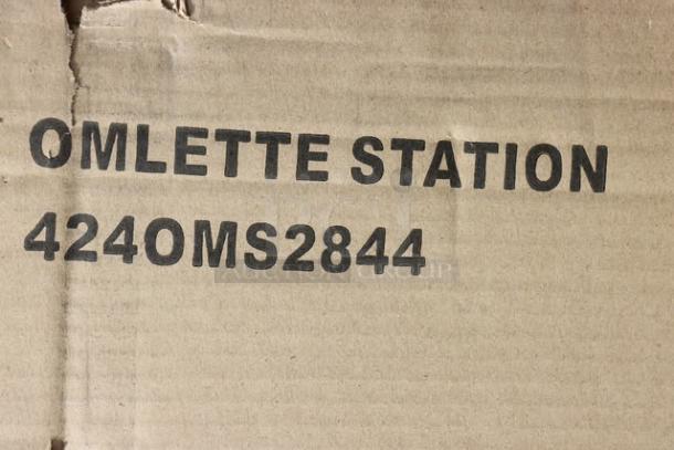 Avantco OMS-284 44"x28" stainless steel omelet/pasta station base in box, model number visible. Brand new condition.