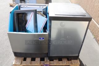 Manitowoc UDF0240W NEO 26" water-cooled ice machine with 90 lb. bin, scratch-n-dent condition, on pallet.