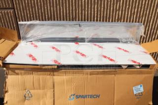 Brand new Cooking Performance Group 351059006 backsplash assembly, out of original packaging, shown in a Spartech box.