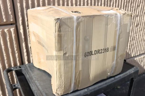 Cardboard box labeled "600LDR2318," indicating Regency liquor display rack, shows signs of mild wear from storage.