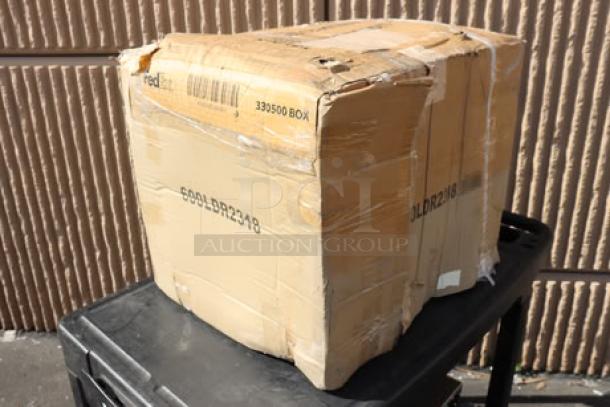 Damaged box containing Regency LDR-2318 liquor display rack and 18"x24" work table. Box shows labels with "LDR2318".