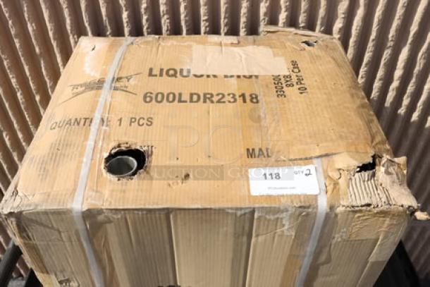 Cardboard box labeled "600LDR2318," containing a Regency stainless steel liquor display rack and work table, scratched and dented condition.