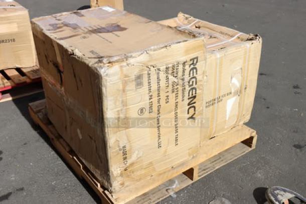 Damaged packaging of a Regency C-3048D-316 stainless steel table and PIB182416 ice bin, on a pallet, showing product details.