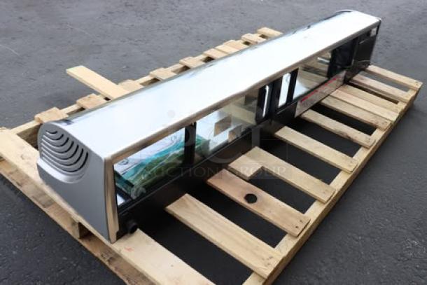 Brand new Hoshizaki HNC-180BA-L-SLH 71" curved glass sushi display case, left side compressor, model visible, out of box.
