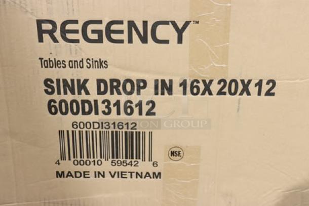 Regency 600DI31612 stainless steel drop-in sink packaging; 16"x20"x12", 16-gauge, three compartments, minor packaging damage.