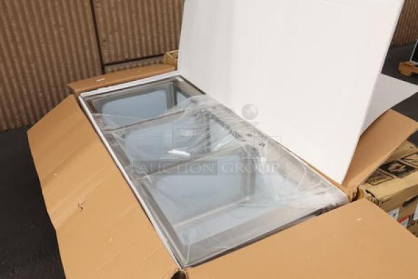 Regency 600DI31612 16" x 20" x 12" stainless steel three compartment drop-in sink, in box, packaging lightly damaged.