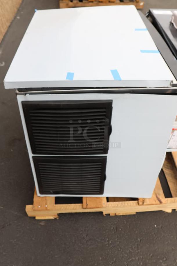 Brand new Avantco Ice MC-F-430-A ice machine, 30" air-cooled, 397 lb capacity, visible scratch-n-dent, on pallet.