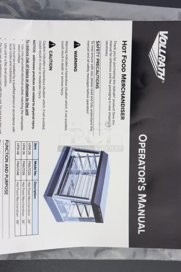 Brand new Vollrath HFM-26 Hot Food Merchandiser, 1440W. Slightly bent frame. S/N: P080-25580719-008. Includes manual.