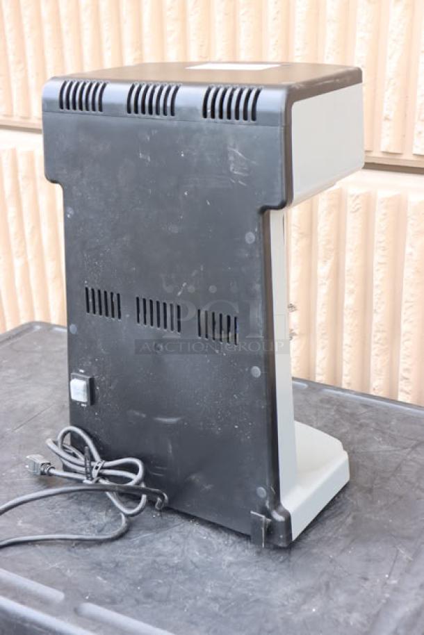 Waring WDM360TX Triple Spindle Drink Mixer, black and white, 120V, 1125W, visible power cord, moderate wear.