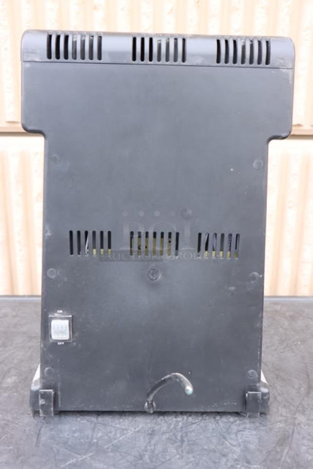 Waring WDM360TX triple spindle drink mixer, viewed from rear. Features include three speeds and timer. Power cord damaged.