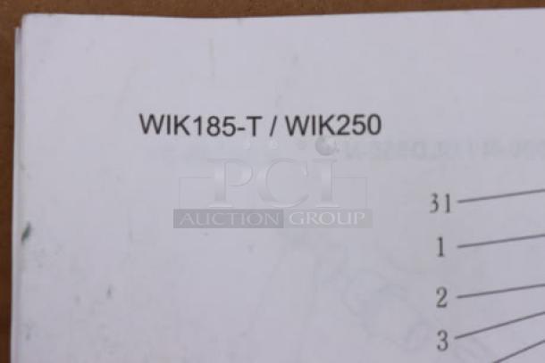 Alt text: Open box Vonci Immersion Blender, model WIK185-T/WIK250, in like-new condition with instruction manual visible.