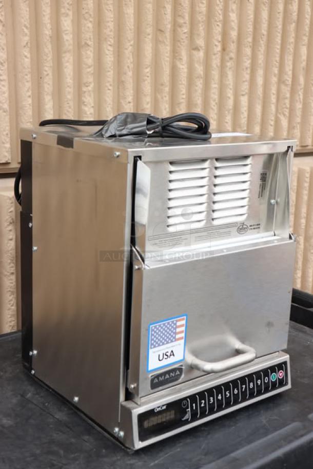 Brand new Amana AOC24 commercial microwave, 2400W, scratch-n-dent condition, visible USA sticker; Model: AOC24.