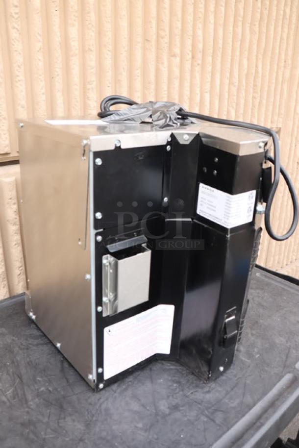 Brand new Amana AOC24 heavy-duty commercial microwave, 208/240V, 2400W, marked scratch-n-dent, with visible labels and power cord.