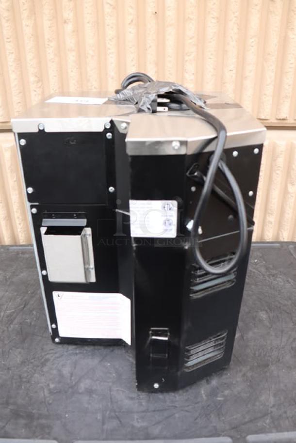 Brand new Amana AOC24 commercial microwave, 2400W, 208/240V, scratch-n-dent, black finish, visible labels, wrapped cord.