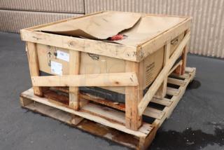 Brand new Avantco CAG-36-RC gas charbroiler, 90,000 BTU, in damaged box; light rust on griddle edge visible.