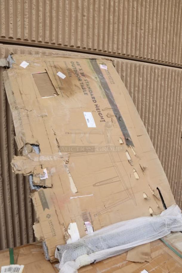 Damaged packaging containing brand new Lancaster Table & Seating 164RD304BLK 48" x 30" Onyx Black Outdoor Table. May be missing parts.