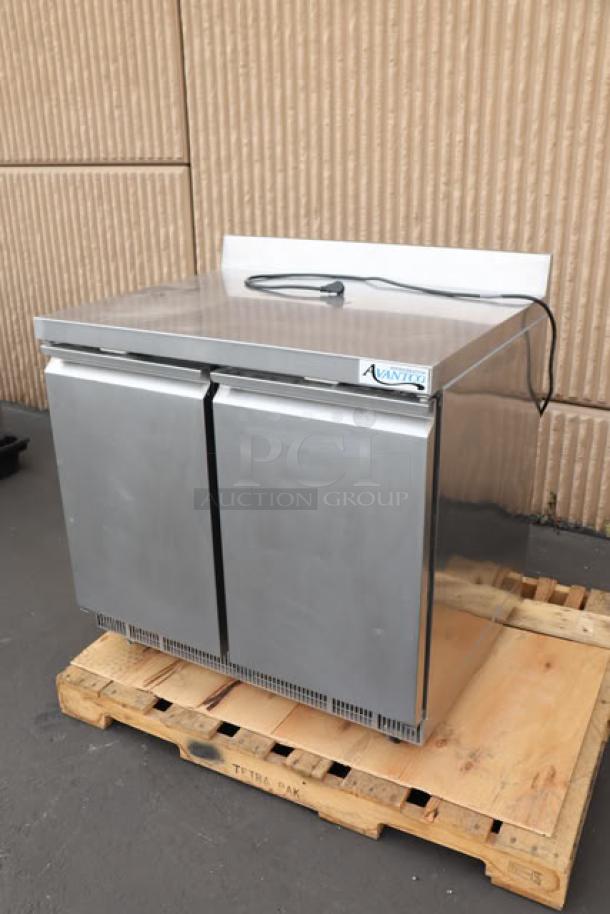 Brand new Avantco ZWT-36R-HC 36" worktop refrigerator with 3 1/2" backsplash, minor scratches, on a pallet.