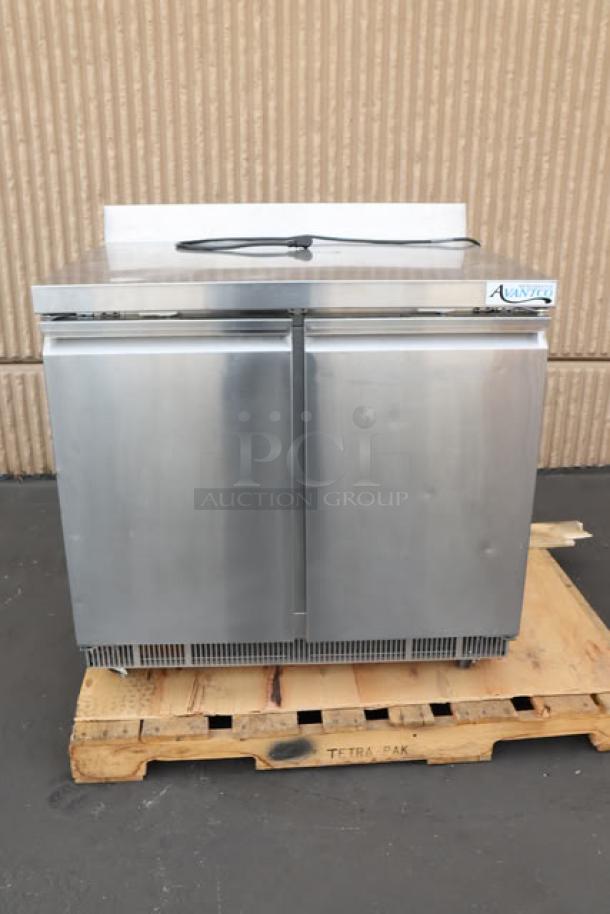 Brand new Avantco ZWT-36R-HC worktop refrigerator, minor scratches, 36" front-breathing, with 3.5" backsplash, on pallet.