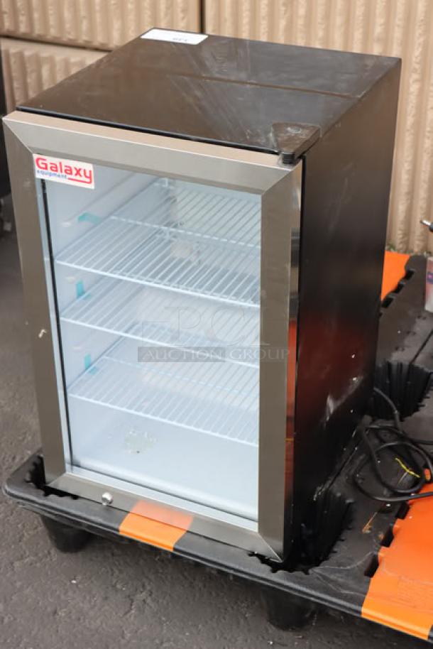 Galaxy CRG-3 black countertop refrigerated merchandiser, 2.5 cu ft, new with scratches. Visible branding on door.