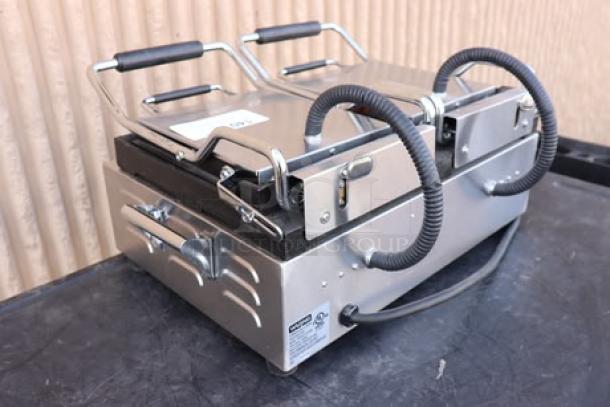 Waring WFG300 dual panini grill, scratch-n-dent, smooth top & bottom, 17"x9.25" surface, 240V, 3120W, new condition.